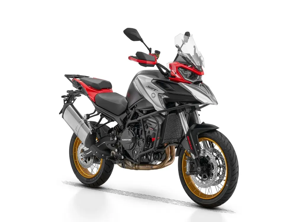 Red, silver and black QJMOTOR SRT 900 SX adventure motorcycle