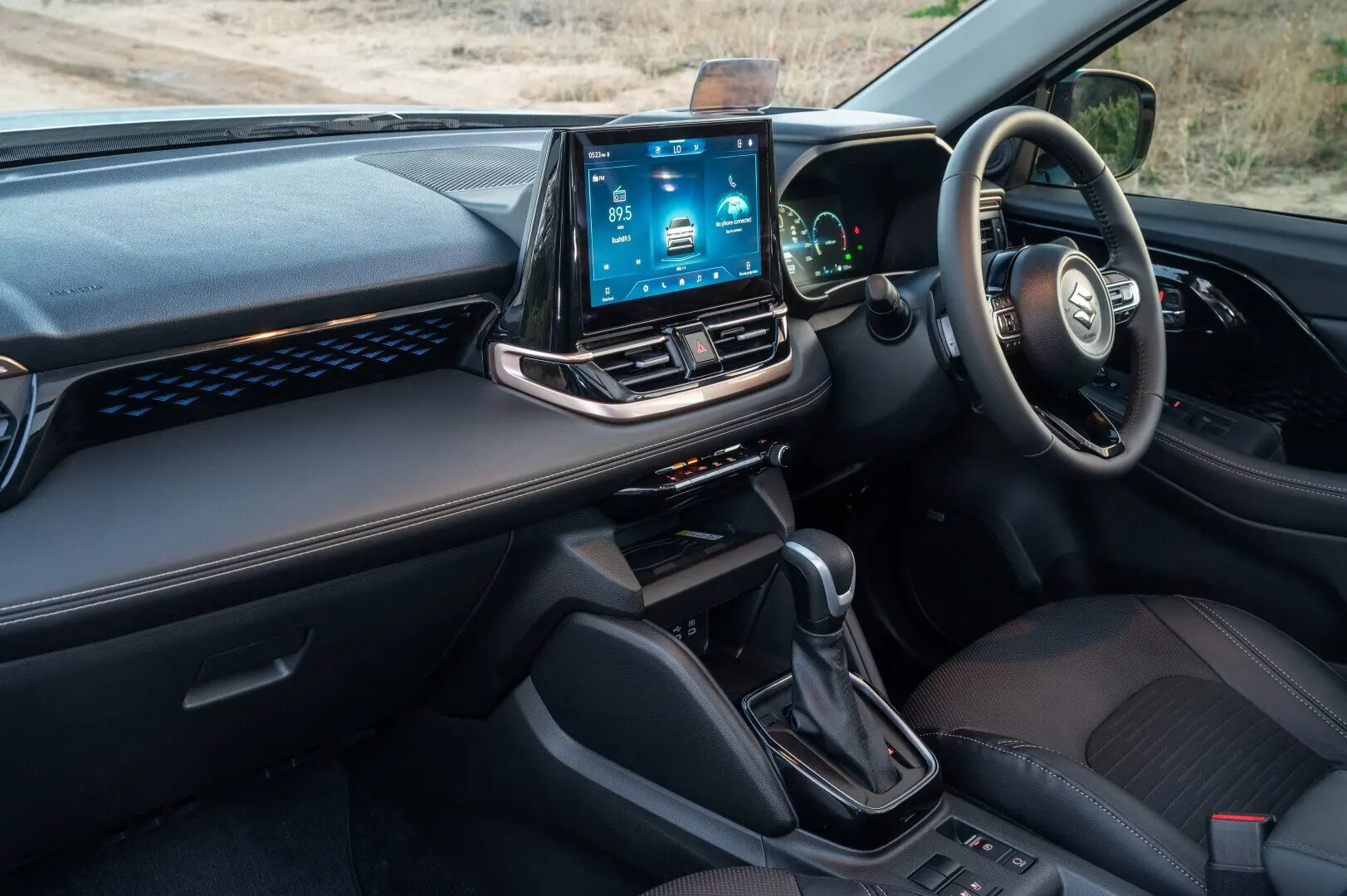 Suzuki Across right-hand-drive dashboard with dual digital displays