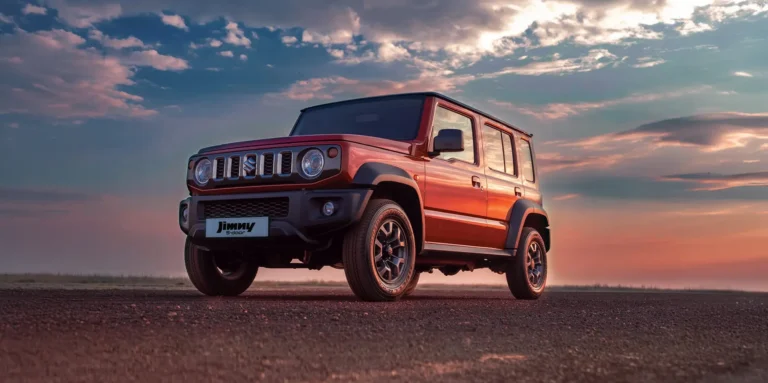 Red Suzuki Jimny 5-door GLX photographed at sunset